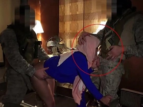 Arab girl in hijab offers military tour of her assets