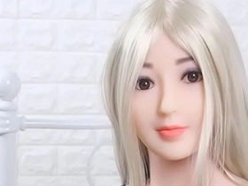 Blonde Asian doll with big tits using sex toys