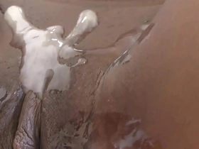 Young African American teen gives a homemade blowjob and gets cum on her shaved pussy