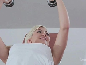 Blonde bombshells indulge in passionate lesbian encounter at the gym