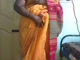Vanitha's solo show of big boobs and shaved pussy in orange saree