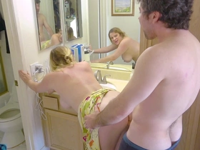 Stepmom's surprise encounter with a big cock in the bathroom