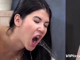 Exotic girls drink and pee together in lesbian sex video