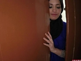 A bashful American tourist pays for a blowjob from an amateur Arab woman in public