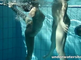 Suzanna and Lucie's sensual underwater play in the pool