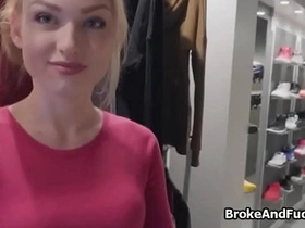 Seductive store clerk gives a blowjob for additional income
