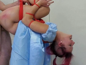 Suspension and anal sex with a dolled up babe