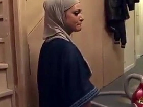A hijab-wearing woman experiences anal intercourse