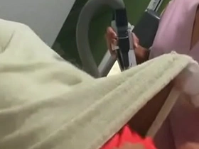 Indian nurse strips to demonstrate laser hair removal