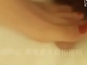 A homemade Chinese video of a woman rejecting a man's advances due to his perceived small penis