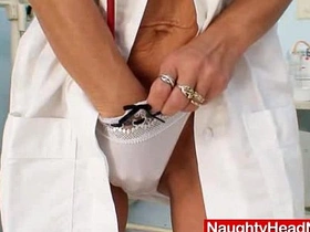 A skinny, gray-haired nurse in uniform explores her own piss hole while seated on a gynochair