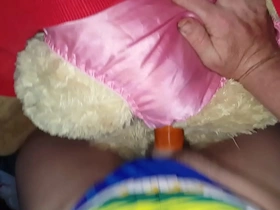 Seductive satin and plush toys in steamy teddy bear sex scene